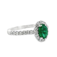 18kt White Gold Natural Oval Emerald and Natural Round Diamond Halo Ring (.86ct)